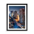 Plakat w ramie 50x70 - Miasto nocą z wieżowcami w tle - miasto, nocą - rama czarna