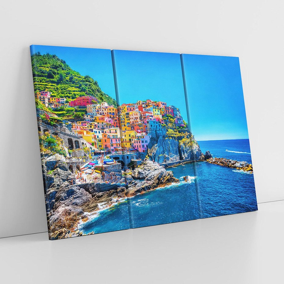 Obraz na płótnie 120x80 - Barwne Wybrzeże - nadmorskie miasto na klifie, kolorowe tęczowe budynki