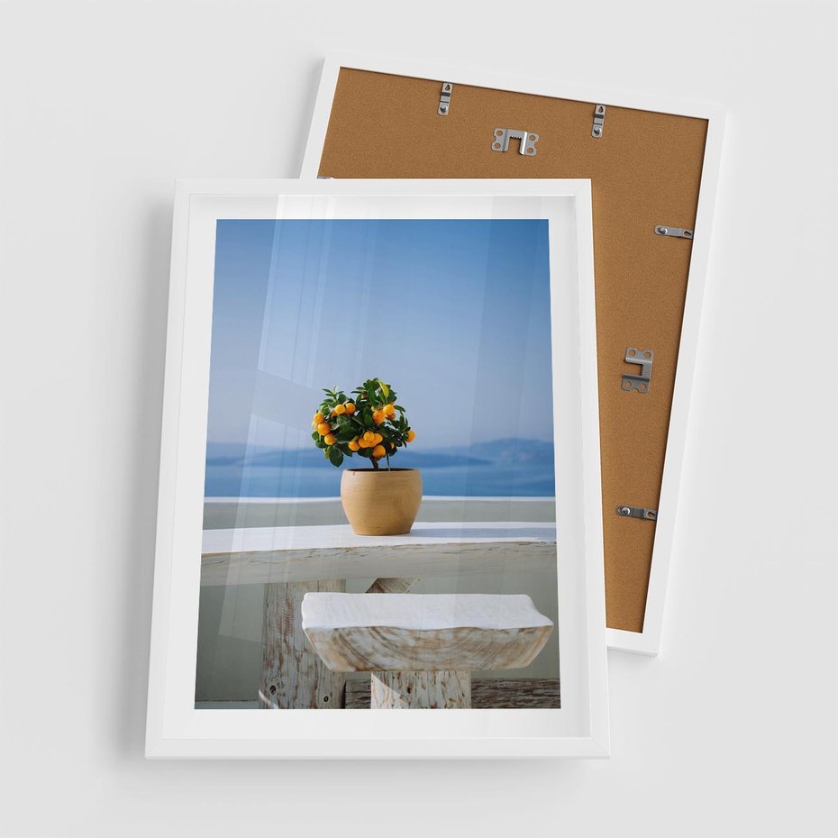 Plakat w ramie 50x70 - Uroki Santorini - Santorini, Grecja - rama biała