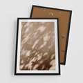 Plakat w ramie 50x70 - Abstrakcyjna Kompozycja: Cień na Ścianie - cień na ścianie, beżowe kolory - rama czarna