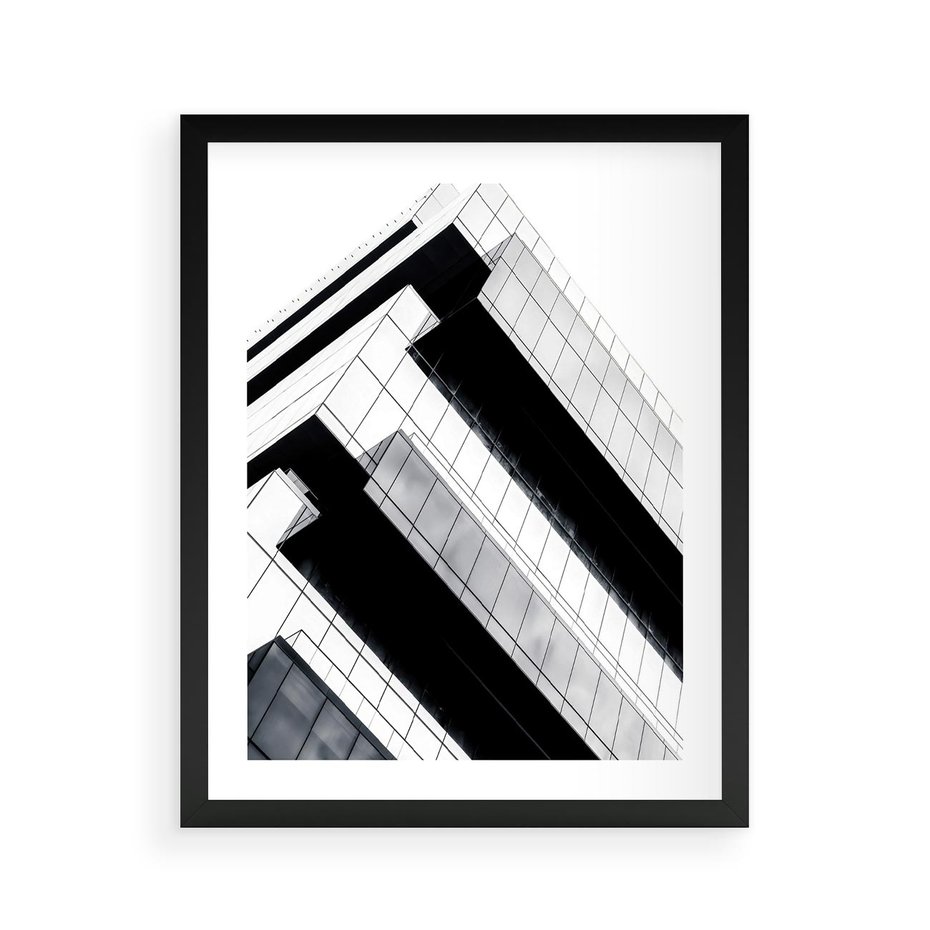 Plakat w ramie 40x50 - Nowoczesna Surowość: Wieżowiec na Czarno-Białej Grafice - architektura, wieżowiec - rama czarna