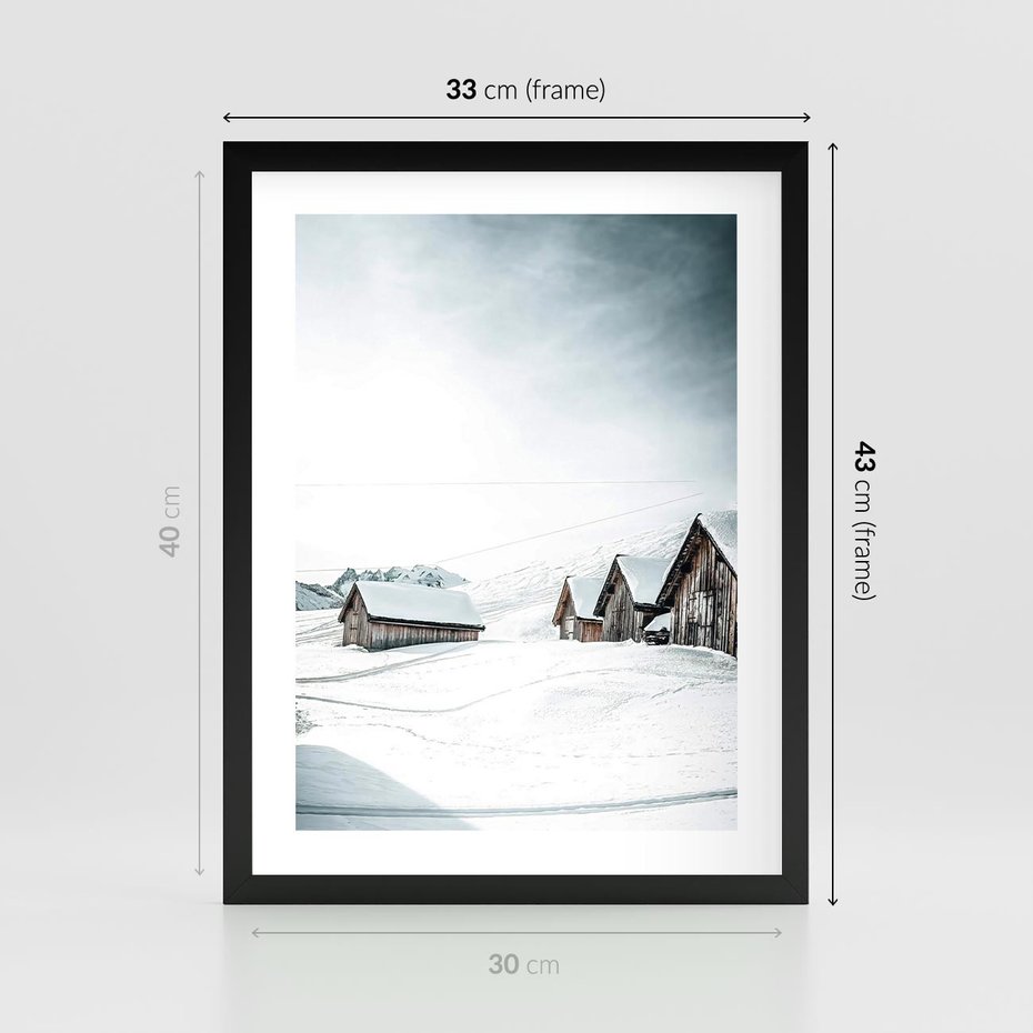 Plakat w ramie 30x40 - Zima w Domkach: Urok Śnieżnej Scenerii - domki w śnieżnym krajobrazie - rama czarna