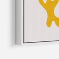 Obraz w ramie 70x100 - Abstrakcyjna Synergia - abstrakcyjna żółta forma, minimalizm - rama biała