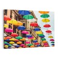 Obraz na płótnie 120x80 - Barwna symfonia wyobraźni - fotografia, kolorowe parasolki podwieszone nad ulicą
