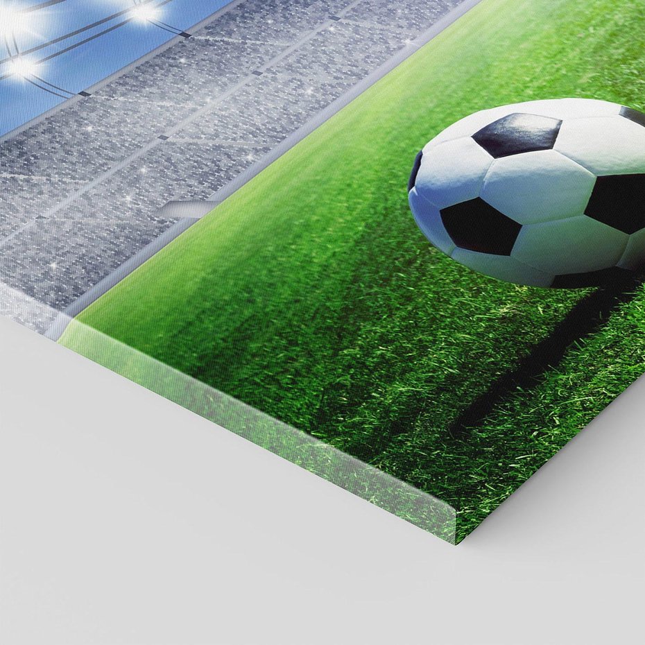 Obraz na płótnie 100x70 - Piłka nożna na stadionie: duch sportu - piłka nożna, stadion