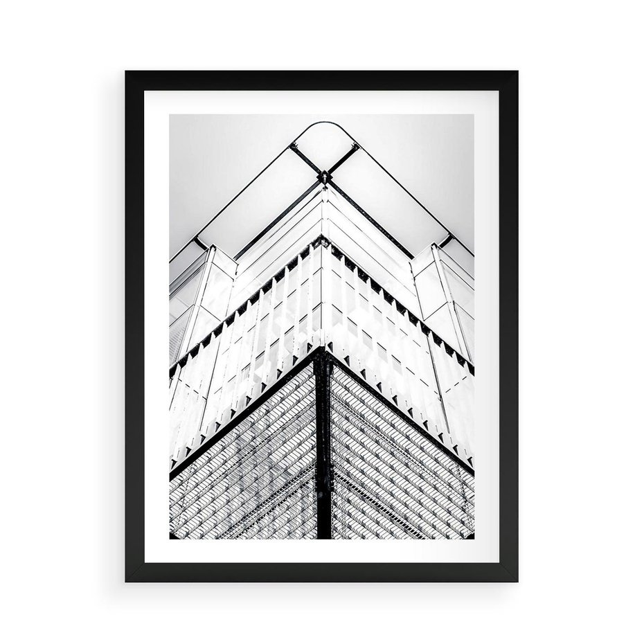 Plakat w ramie 50x70 - Elegancja Współczesnej Architektury: Wieżowiec w Monochromii - nowoczesna architektura, czarno biała fotografia - rama czarna