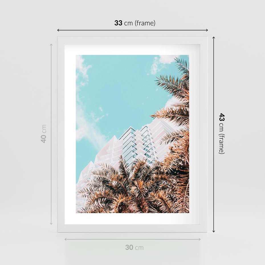 Plakat w ramie 30x40 - Wakacyjny Raj - palmy, wysokie budynki - rama biała