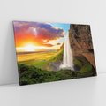 Obraz na płótnie 120x80 - Zachód słońca nad islandzkim wodospadem - Islandia, wodospad