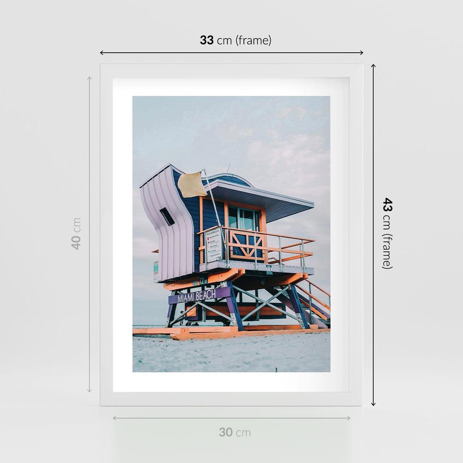 Plakat w ramie 30x40 - Plażowa Kolorystyka: Budka Ratownika w Pastelach - pastelowa budka ratownika, plaża Miami - rama biała