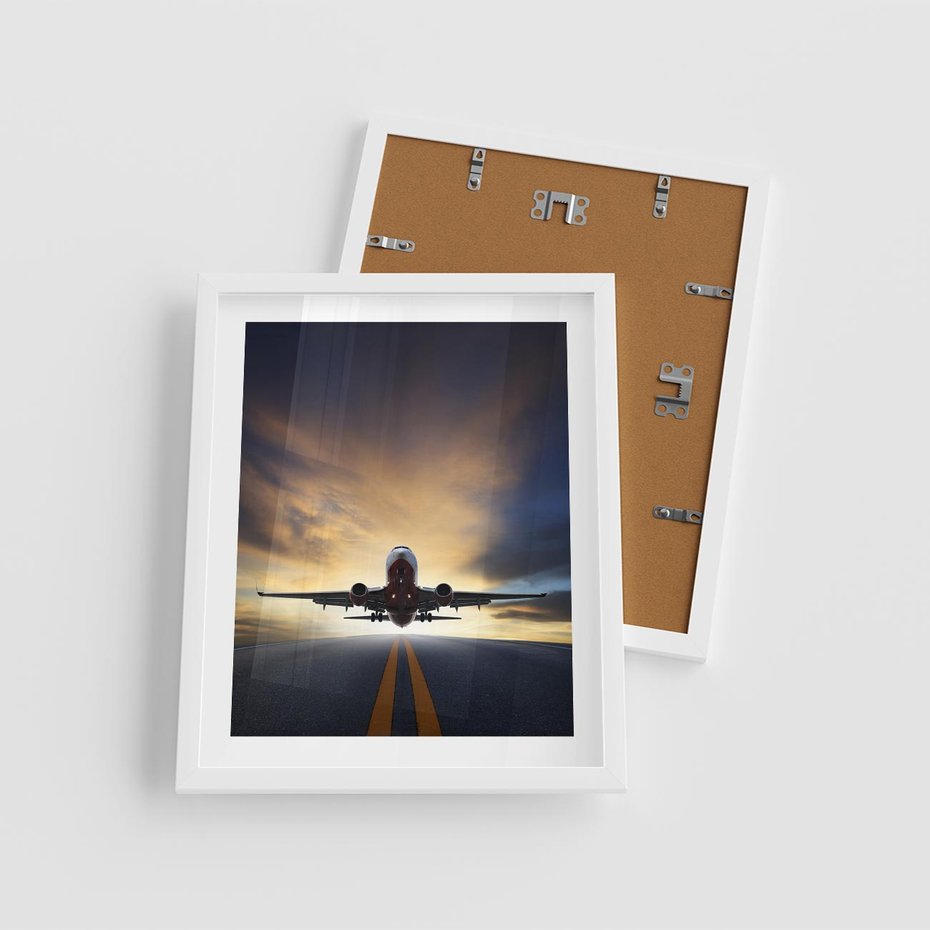 Plakat w ramie 40x50 - Podróż samolotem w pejzaż - samolot, podróż - rama biała