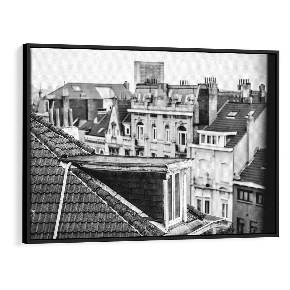 Obraz w ramie 70x50 - Miasto w Retro Odsłonie - fotografia czarno biała, ujęcie na dachy wielkiego miasta - rama czarna