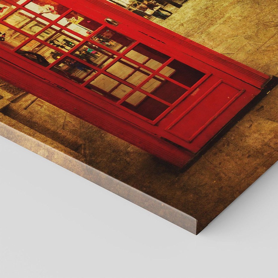 Obraz na płótnie 70x100 - Ikoniczna budka telefoniczna w Londynie - sepia, budka