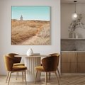 Obraz w ramie 80x80 - Tajemnicza Ścieżka - latarnia morska w oddali, suche trawy - rama drewno