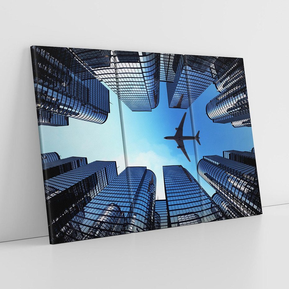 Obraz na płótnie 120x80 - Miasto o niezwykłym widoku - latające samoloty - miasto, samolot