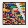 Obraz w ramie 50x50 - Barwna symfonia wyobraźni - fotografia, kolorowe parasolki podwieszone nad ulicą - rama czarna