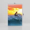 Obraz na płótnie 70x100 - Surfer na falach morza: Spotkanie z wolnością - surfer, surfing