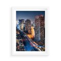 Plakat w ramie 50x70 - Miasto nocą z wieżowcami w tle - miasto, nocą - rama biała