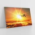 Obraz na płótnie 70x50 - Wolność podróży - samolot, słońce