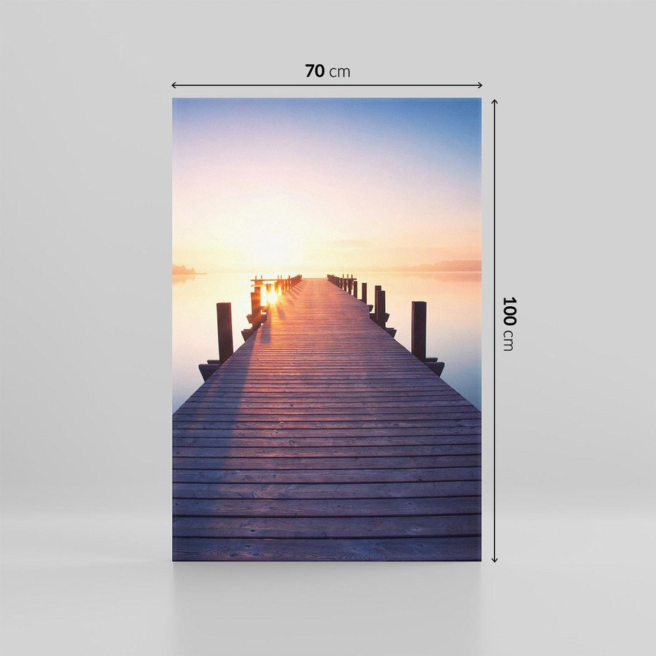 Obraz na płótnie 70x100 - Zachód słońca nad molo: Magia morza - molo, zachód słońca