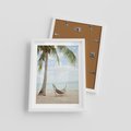 Plakat w ramie 30x40 - Relaks na plaży - palma, hamak - rama biała