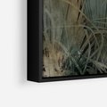 Obraz w ramie 100x70 - Światło w mroku duszy - liście traw, mroczny klimat - rama czarna