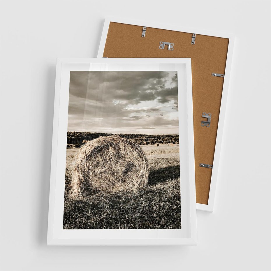 Plakat w ramie 50x70 - Ciepło Natury - snopki siana, pole - rama biała