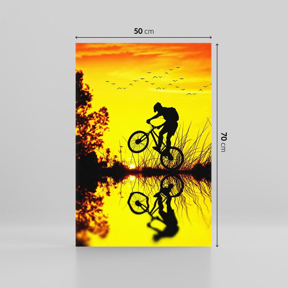 Obraz na płótnie 50x70 - Rower przy zachodzie słońca - rower, zachód