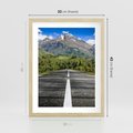 Plakat w ramie 30x40 - Droga przez góry: podróż do przygody - droga, góry - rama drewno
