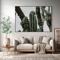 Obraz w ramie 100x70 - Boho oaza wśród kaktusów - kaktusy, pustynia - rama czarna
