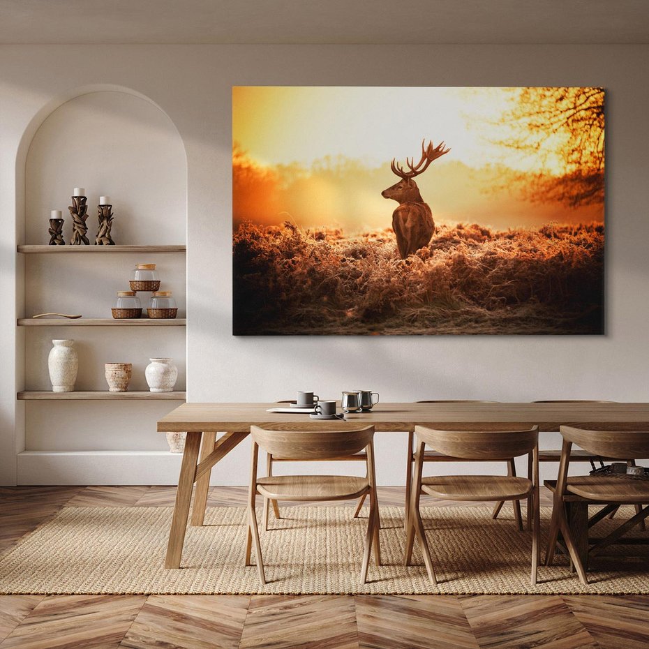 Obraz na płótnie 70x50 - Magia jesiennego słońca: Jeleń w promieniach - jeleń, jesień