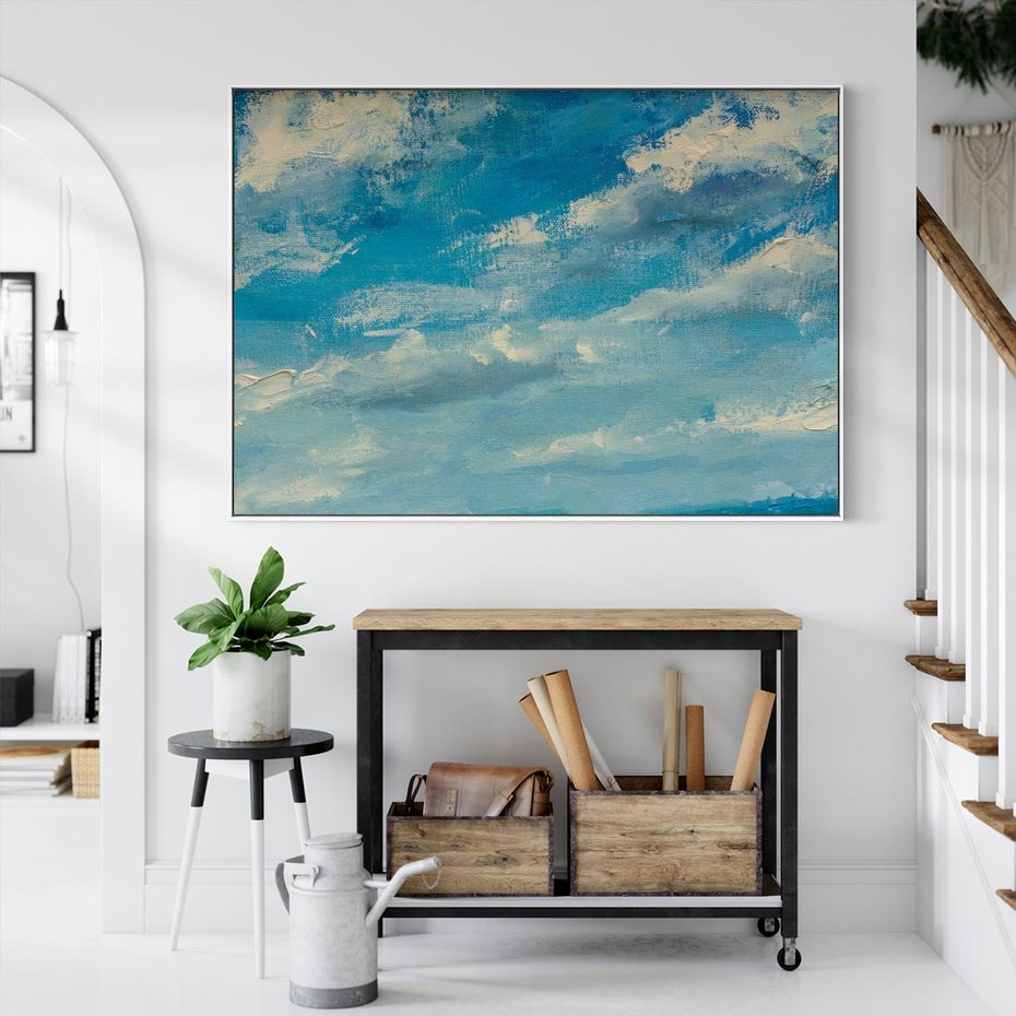 Obraz w ramie 100x70 - Oddechy niebiańskiej materii - olejny obraz, smugi farby przypominają obłoki na błękitnym niebie - rama biała