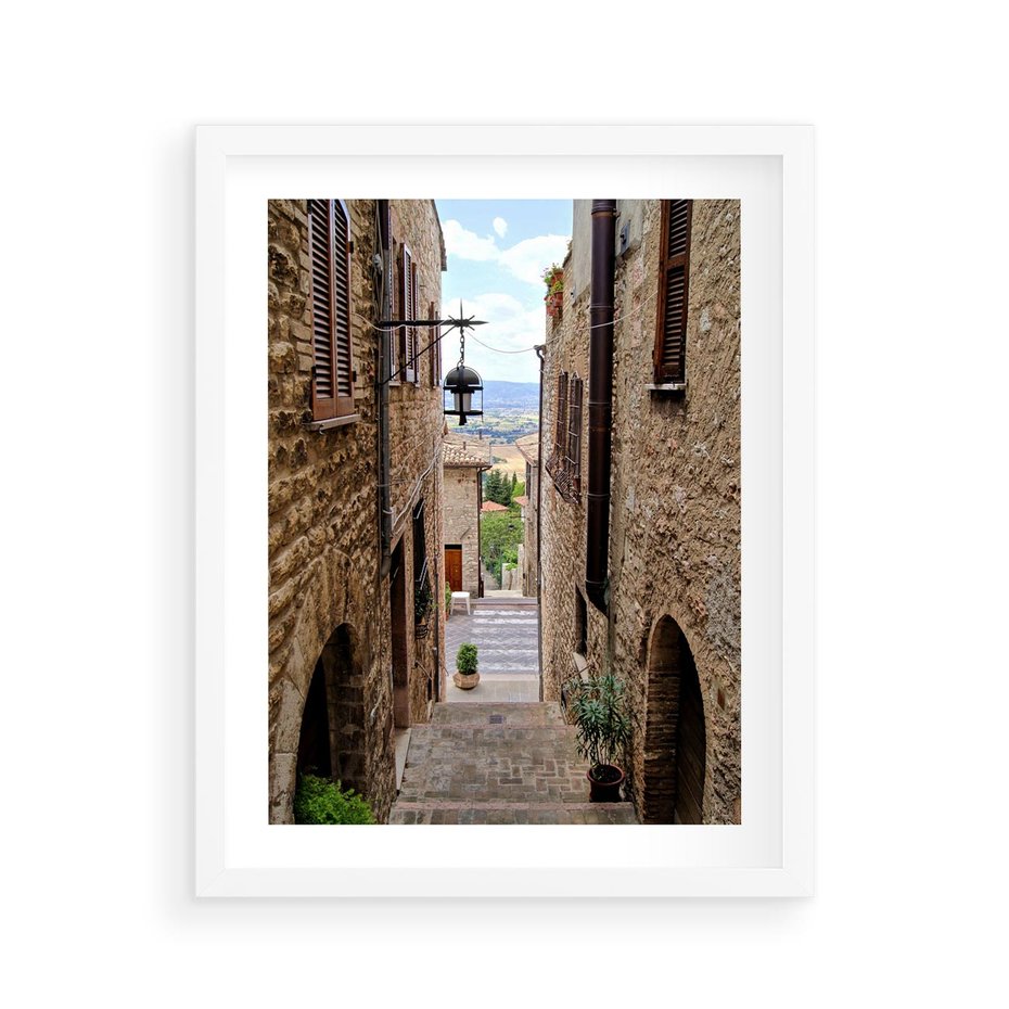 Plakat w ramie 40x50 - Perspektywa malowniczej uliczki - uliczka, perspektywa - rama biała