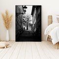 Obraz w ramie 70x100 - Ukryta Uliczka - czarno białe zdjęcie, schody - rama czarna