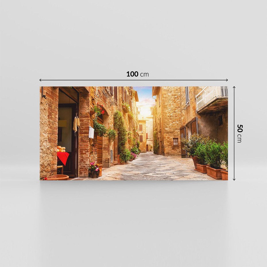 Obraz na płótnie 100x50 - Urok uliczki miejskiej z kwiatami - sklep, uliczka