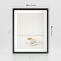 Plakat w ramie 40x50 - Kawa w Prostocie - kawa w filizance, białe tłó - rama czarna