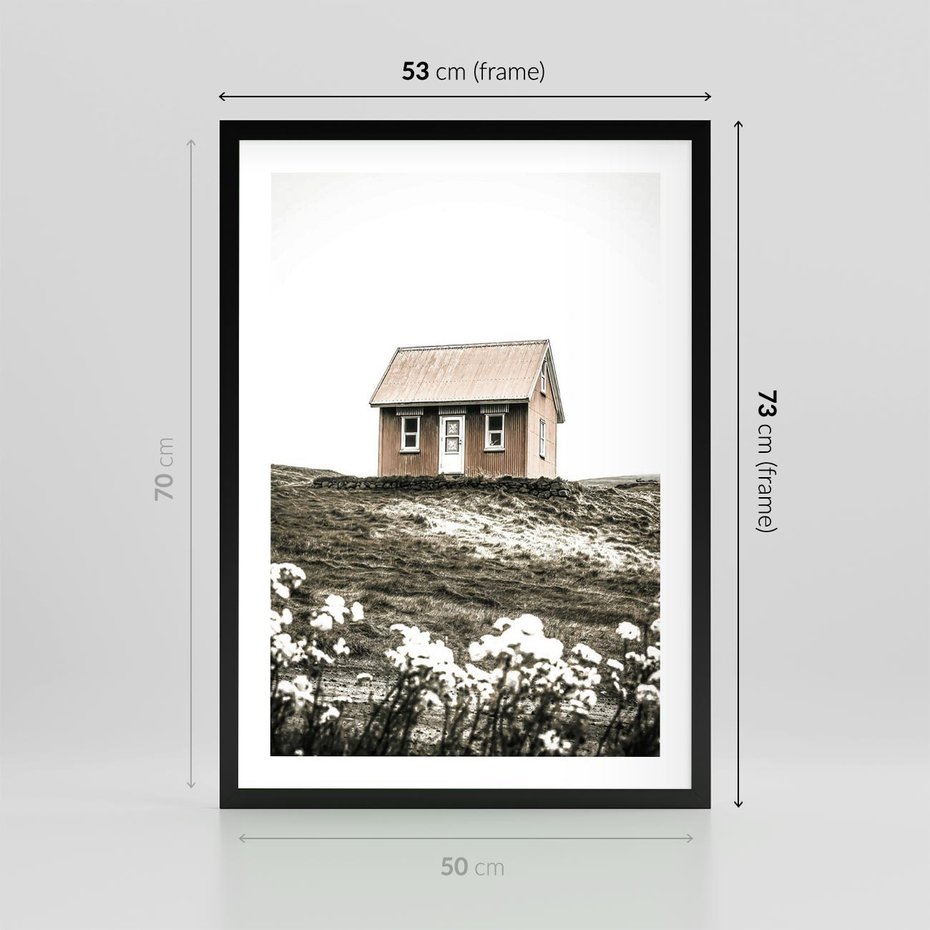 Plakat w ramie 50x70 - Krajobraz z Przeszłości: Kwitnąca Łąka w Sepii - domek na wzgórzu, kwitnąca łąka - rama czarna