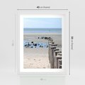 Plakat w ramie 40x50 - Fale na falochronie nad morzem - morze, falochron - rama biała
