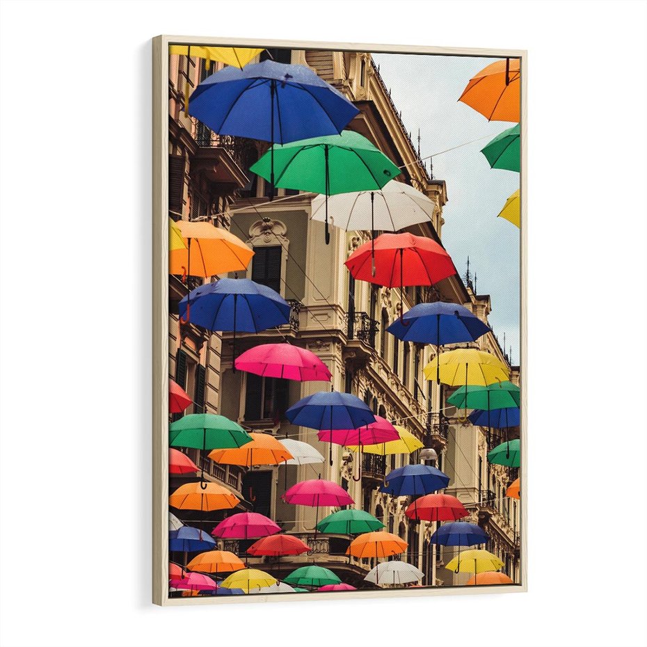 Obraz w ramie 70x100 - Barwna symfonia wyobraźni - fotografia, kolorowe parasolki podwieszone nad ulicą - rama drewno