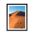 Plakat w ramie 50x70 - Piasek pustyni wędruje - pustynia, piasek - rama czarna