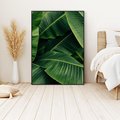 Obraz w ramie 70x100 - Zaklęta roślinna ekspresja - liście bananowca, gęsto ułożone - rama czarna