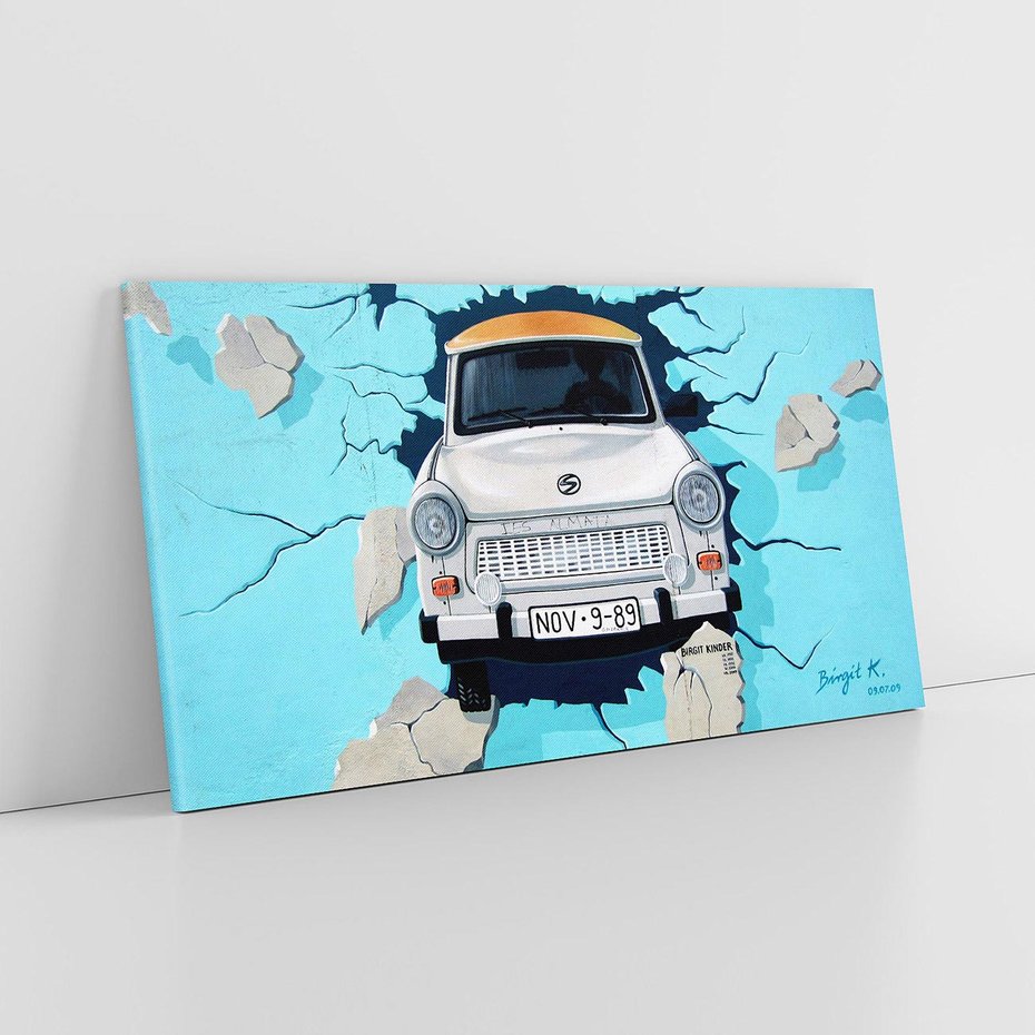 Obraz na płótnie 140x70 - Graffiti wśród gór artystyczne spojrzenie - samochód, graffiti