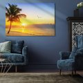 Obraz na płótnie 100x70 - Słońce, plaża i palmy: romantyczny zachód - plaża, zachód
