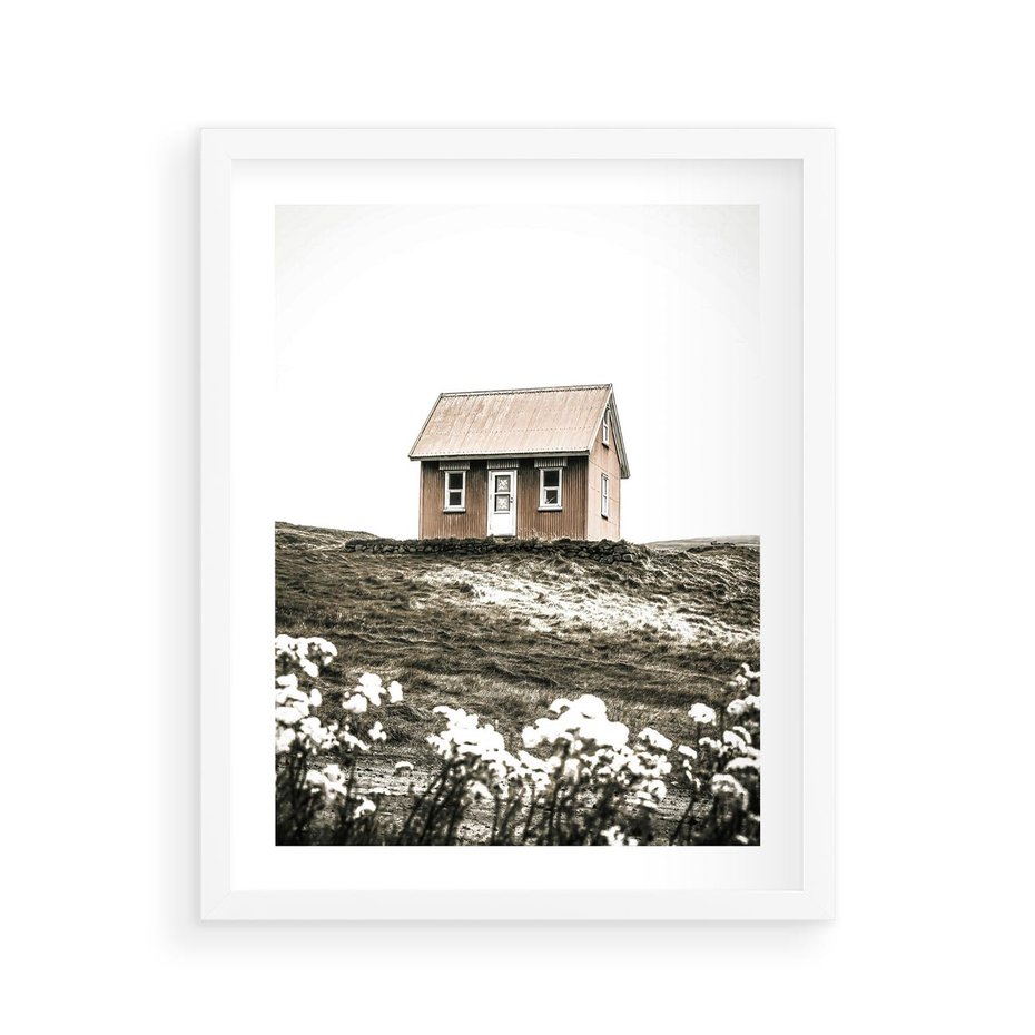 Plakat w ramie 40x50 - Krajobraz z Przeszłości: Kwitnąca Łąka w Sepii - domek na wzgórzu, kwitnąca łąka - rama biała