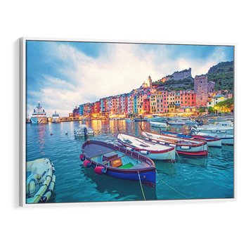 Obraz w ramie 100x70 - Tańczące kolory zachodu - nadmorskie kolorowe miast, kolorowe budynki na brzegu - rama biała