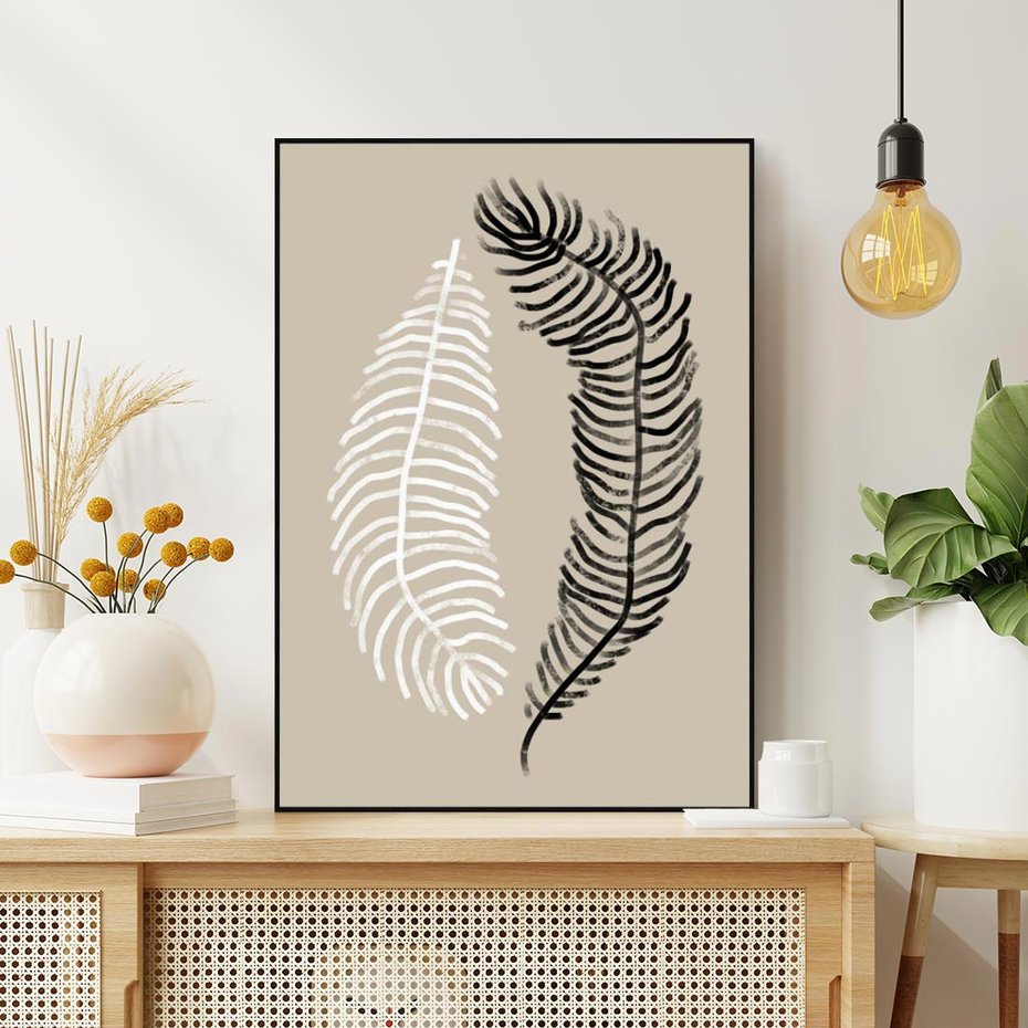 Obraz w ramie 70x100 - Spleciona Harmonia - sztuka nowoczesna, białe i czarne pióro - rama czarna
