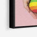 Obraz w ramie 70x100 - Miłość na Dłoniach - zdjęcie, dłonie trzymają ulepione tęczowe serce - rama czarna