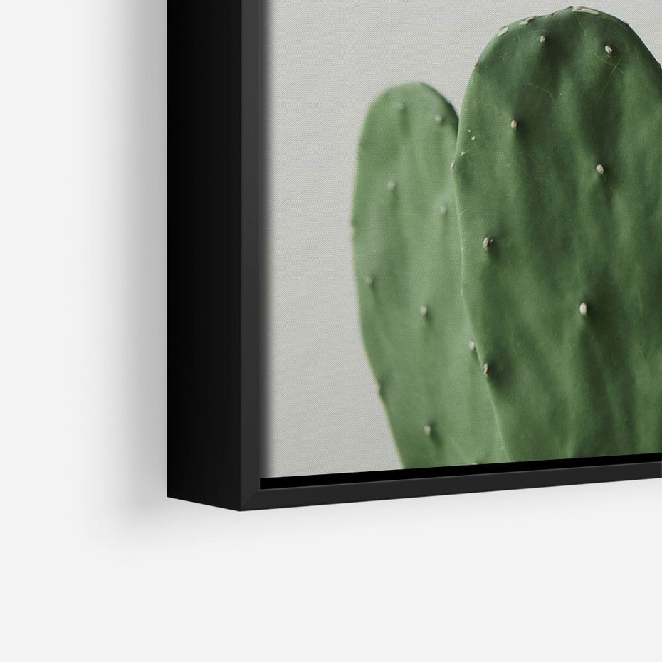 Obraz w ramie 70x100 - Majestatyczne Wysokości - kaktusy, liście - rama czarna