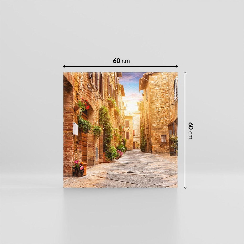 Obraz na płótnie 60x60 - Urok uliczki miejskiej z kwiatami - sklep, uliczka