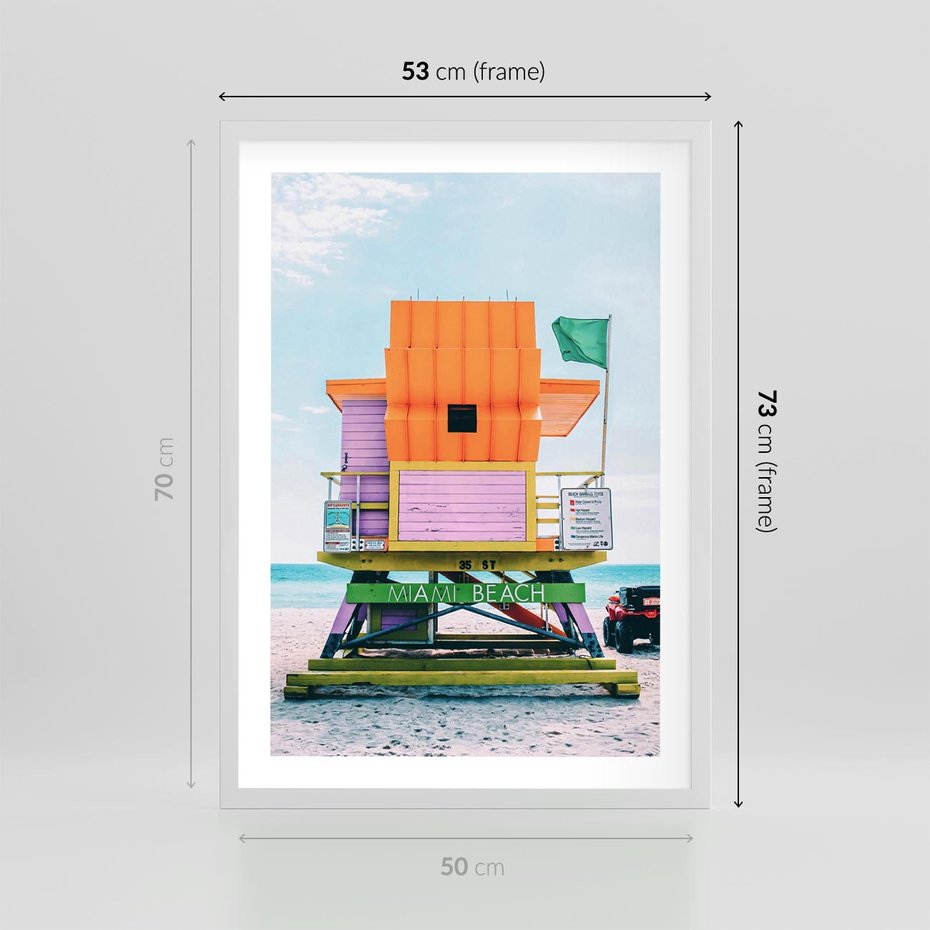 Plakat w ramie 50x70 - Plaża Miami w Słoneczny Dzień - domek ratownika, kolorowy - rama biała