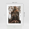 Plakat w ramie 30x40 - Jesienna Wieża w Liściach - architektura, wieża - rama biała
